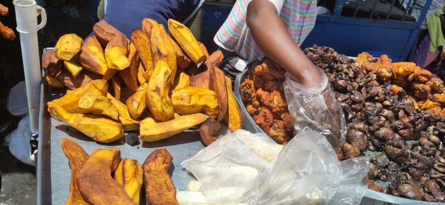 Kampala: Three-Hour Food Tour - Watching the grill and trying roast meat