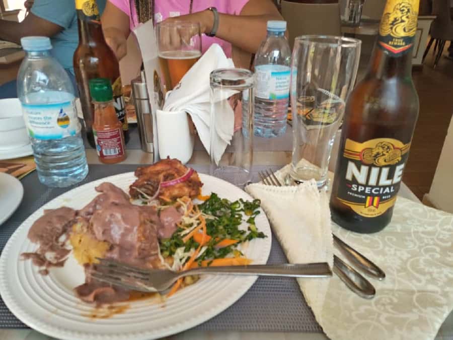 Kampala: Three-Hour Food Tour - Sitting down to a full Ugandan spread