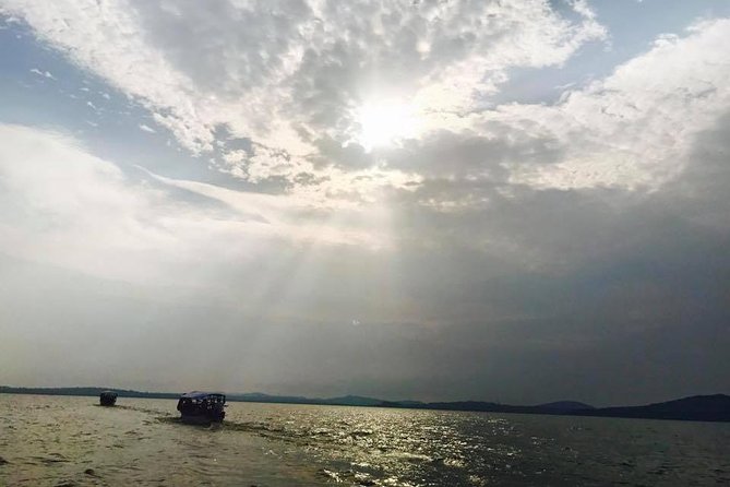 Lake Victoria Island Cycling Tour from Kampala - Leaving Kampala behind by boat